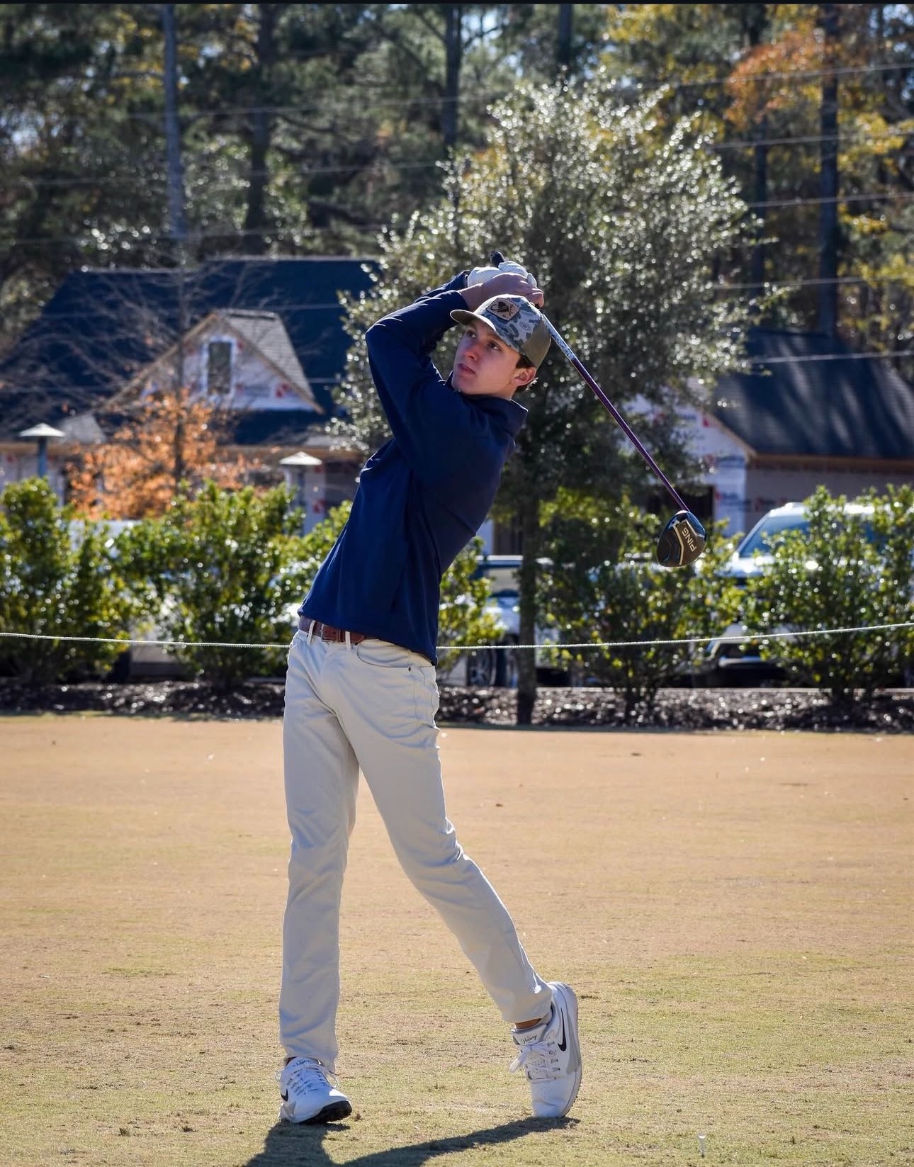 Karsen Wilkins mid-swing